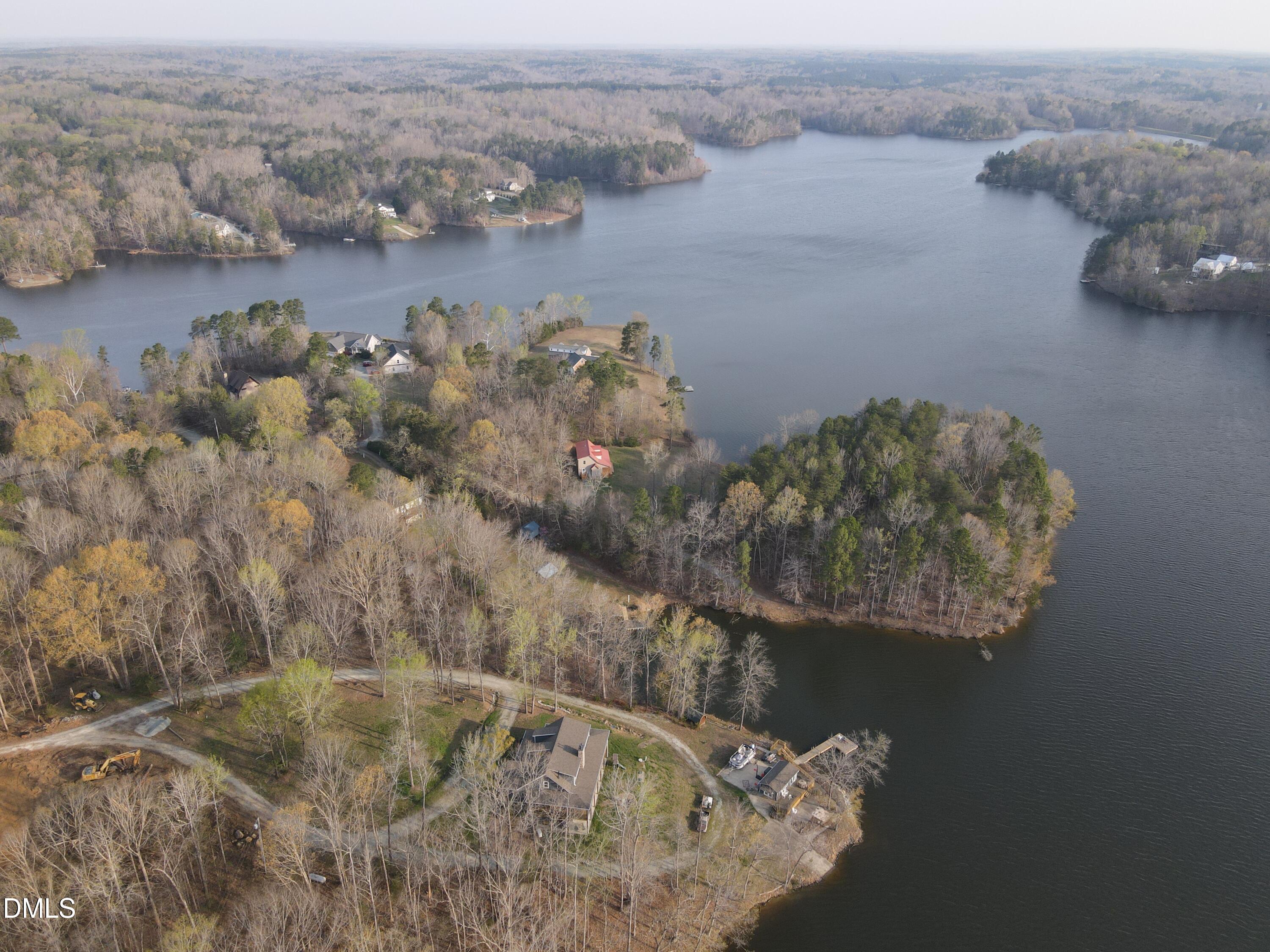130 Lake View Road Prospect Hill, NC 27314 - Photo 5 of 73 an aerial view of a house with a yard and lake view