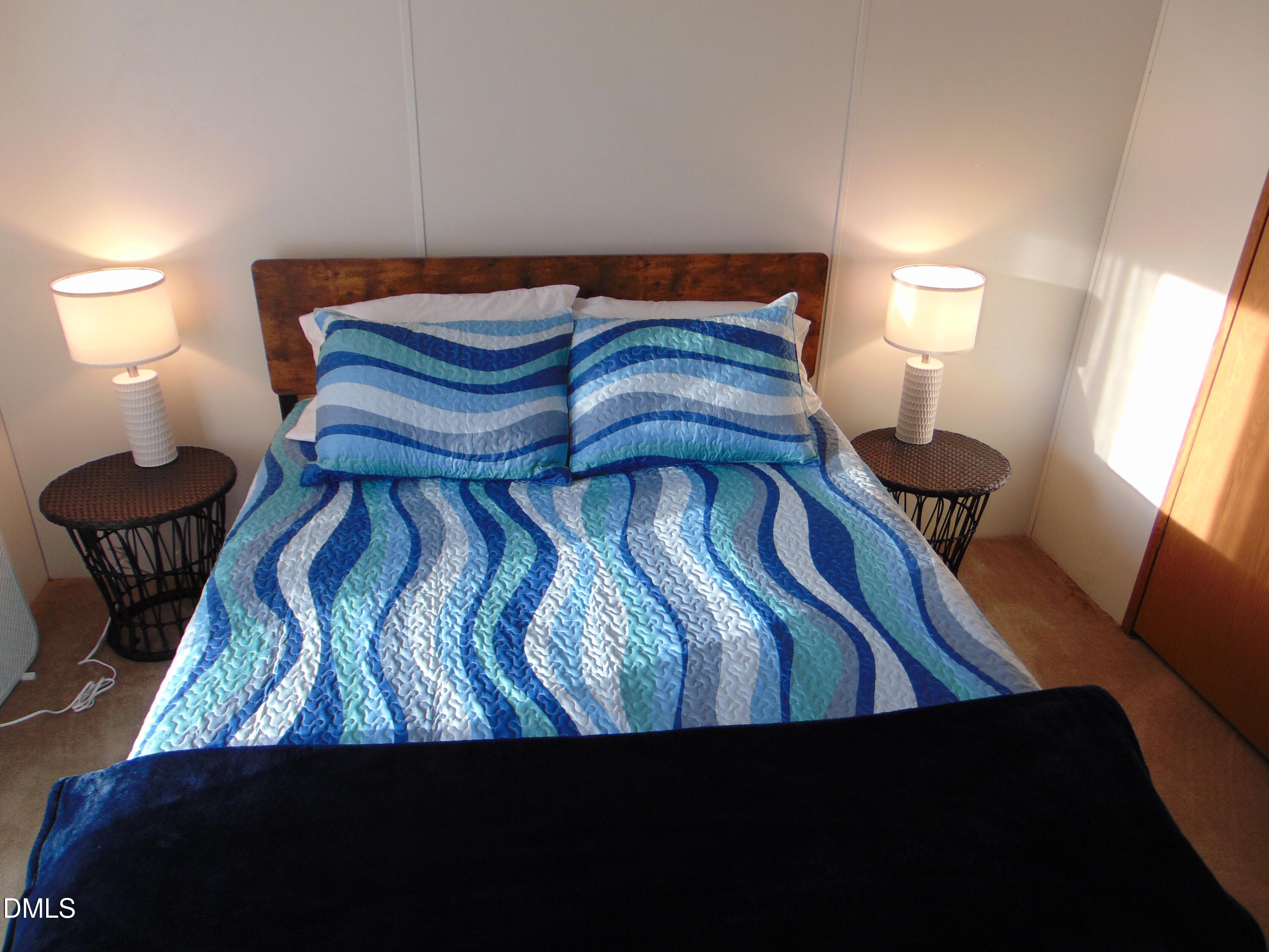 130 Lake View Road Prospect Hill, NC 27314 - Photo 67 of 73 a bedroom with a bed and window