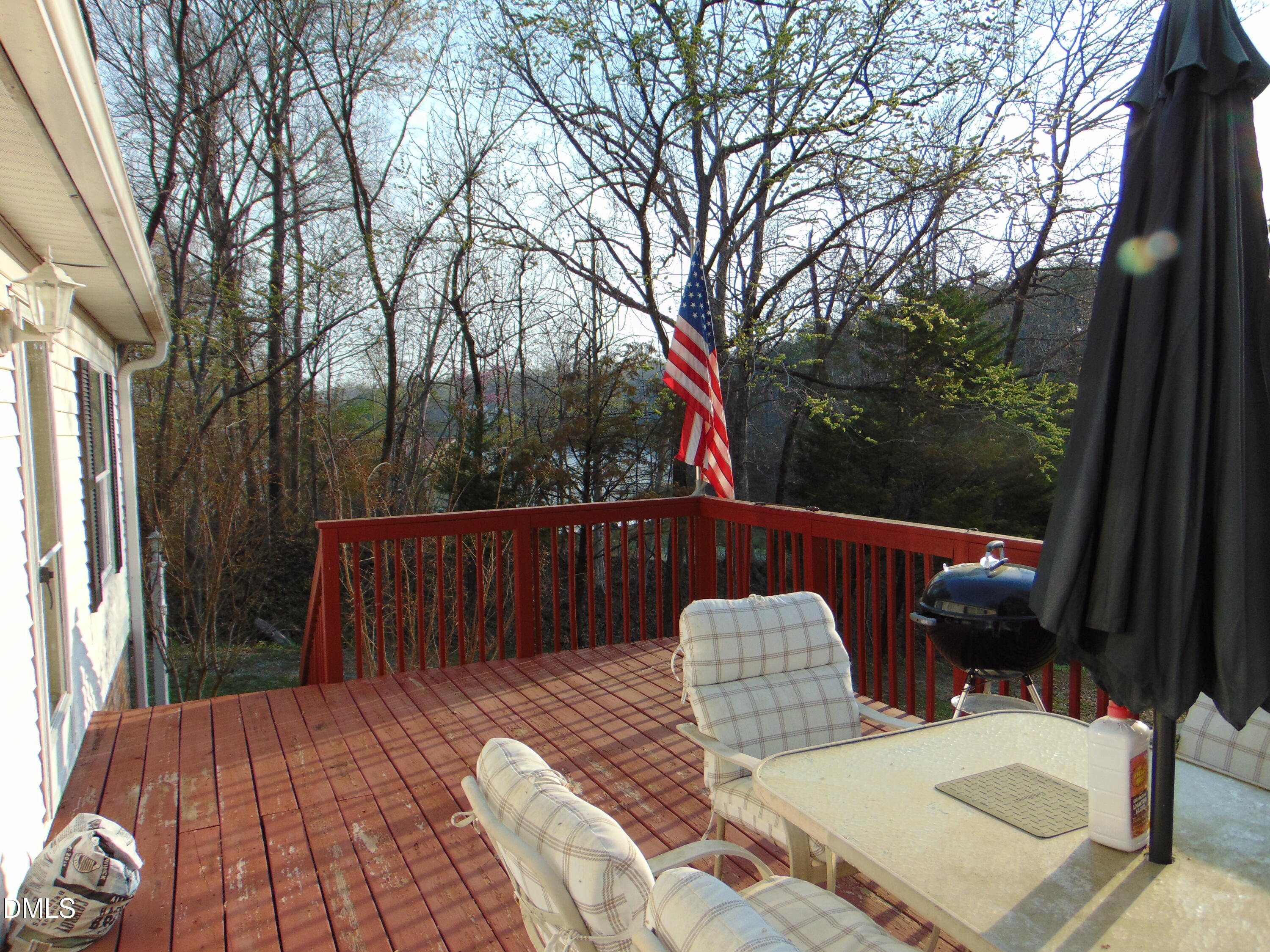 130 Lake View Road Prospect Hill, NC 27314 - Photo 69 of 73 a view of balcony with wooden floor and outdoor seating