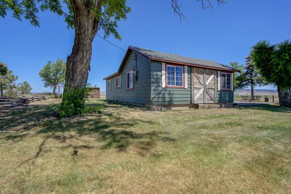 a house view with a garden space