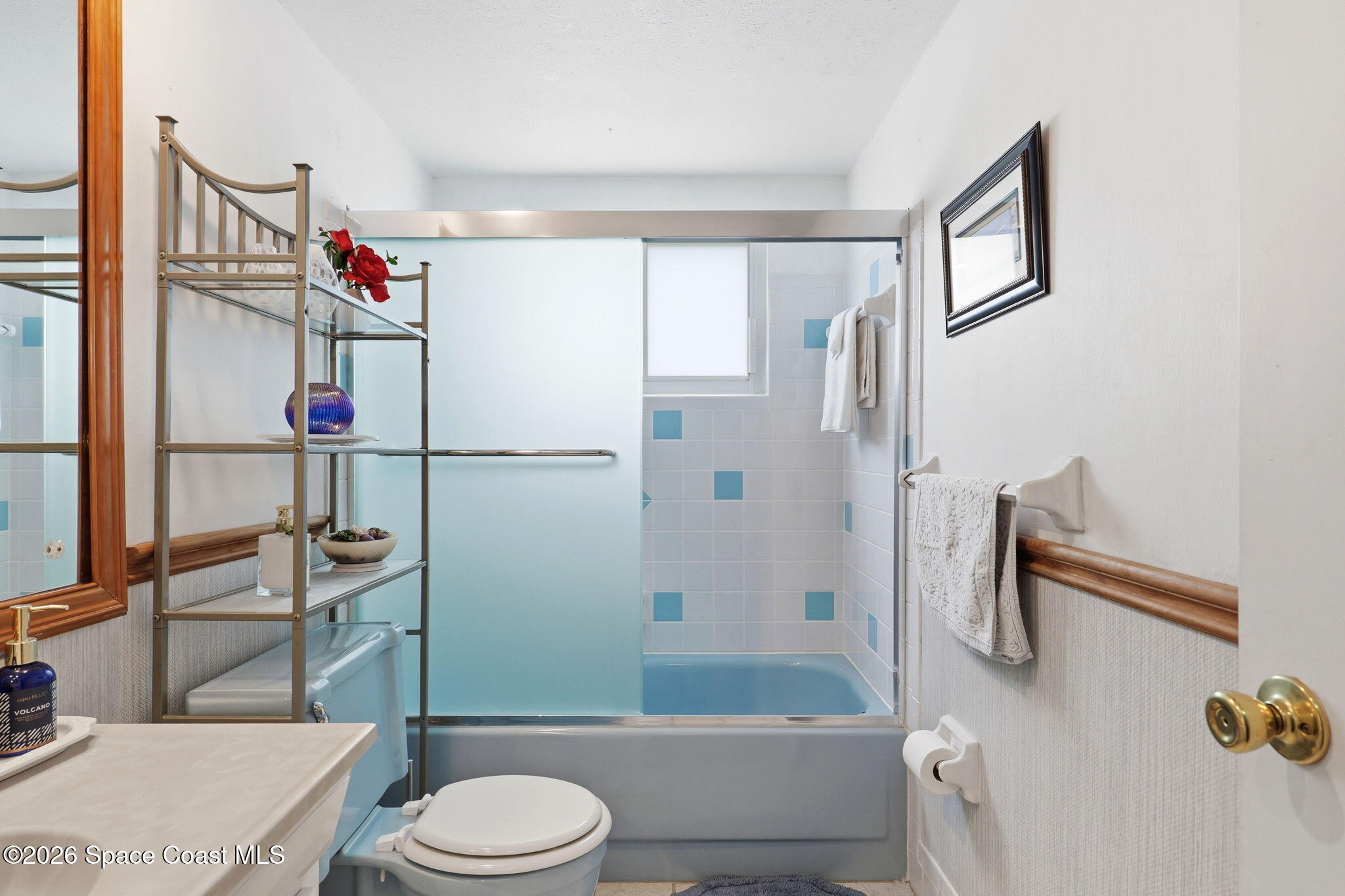 908 Jefferson Road Rockledge, FL 32955 - Photo 18 of 37 a bathroom with a sink a toilet and shower