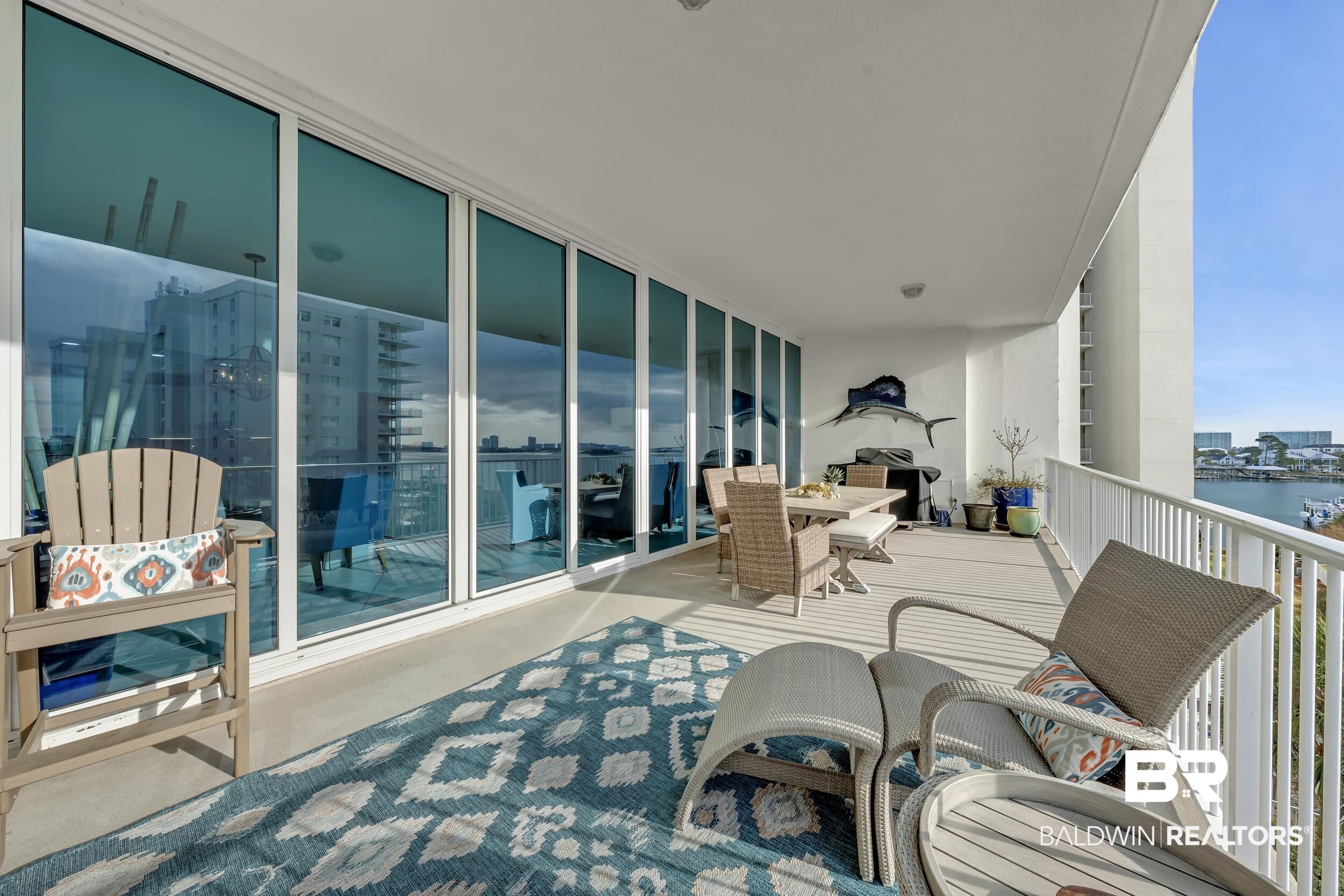 28250 Canal Road, Unit 307 Orange Beach, AL 36561 - Photo 32 of 56 Balcony featuring outdoor dining area