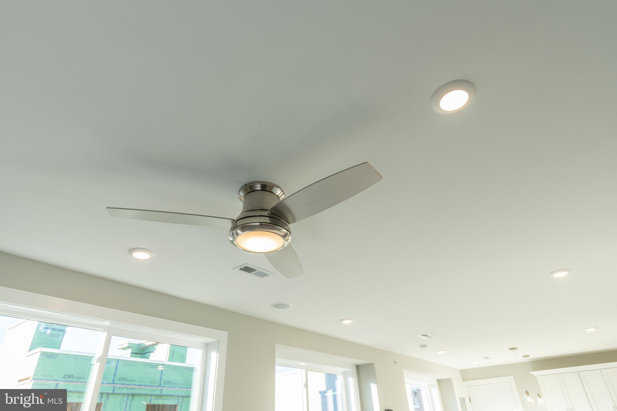 2517 Hope Street, Unit 5 Philadelphia, PA 19133 - Photo 11 of 35 a view of a room with a chandelier fan and window