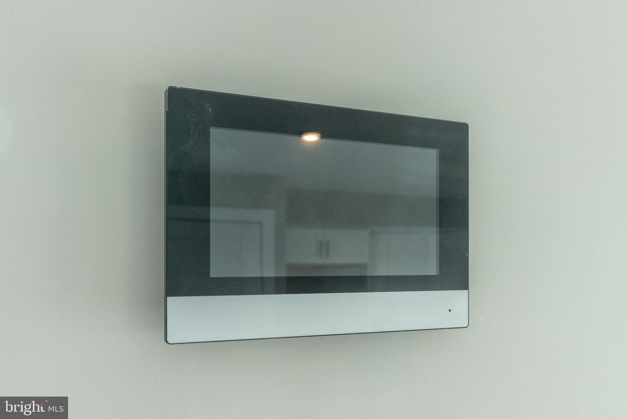 2517 Hope Street, Unit 5 Philadelphia, PA 19133 - Photo 12 of 35 a bathroom with a glass door