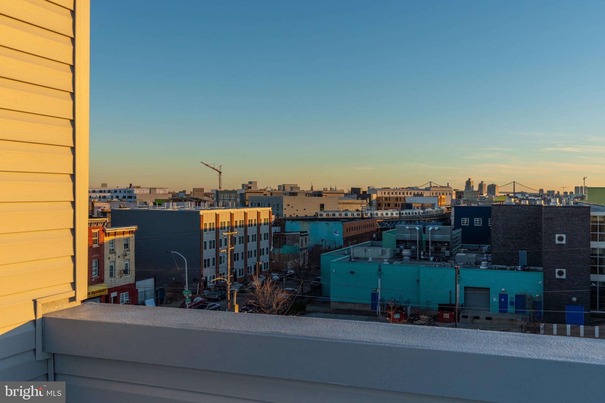2517 Hope Street, Unit 5 Philadelphia, PA 19133 - Photo 32 of 35 a view of a city with tall buildings