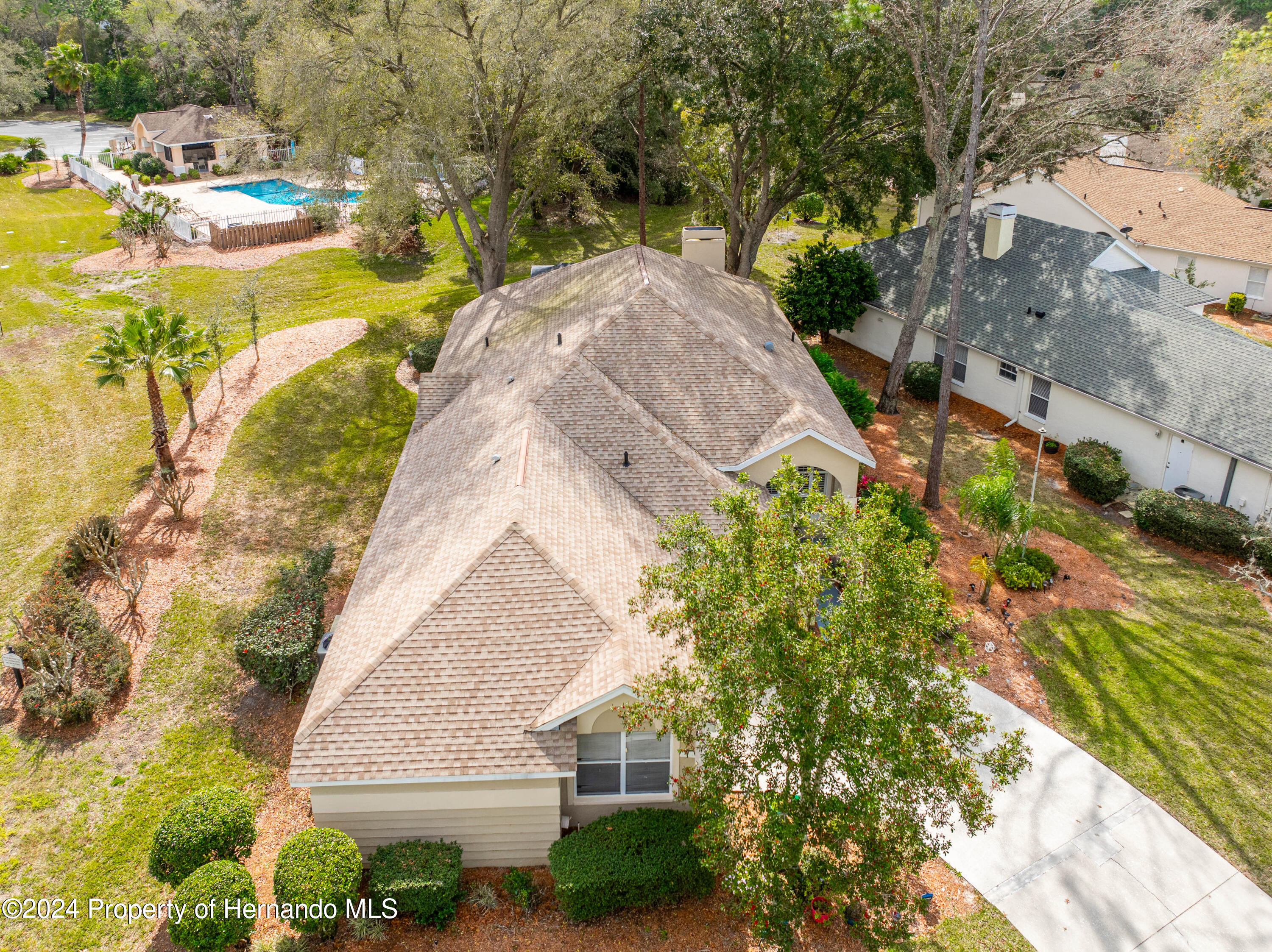 1 Byrsonima Loop Homosassa, FL 34446 - Photo 13 of 41 a view of a house with a yard and sitting area