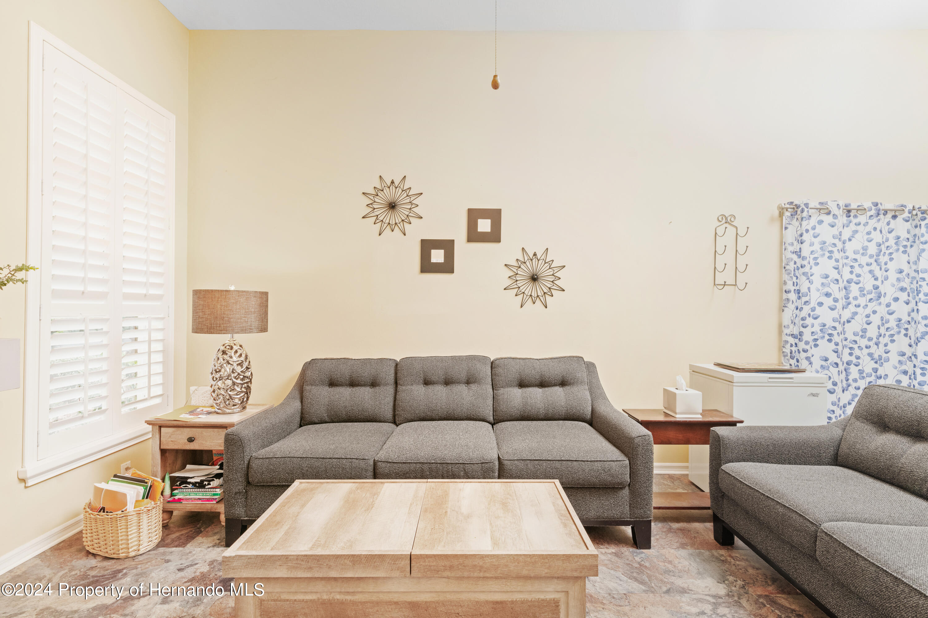 1 Byrsonima Loop Homosassa, FL 34446 - Photo 19 of 41 a living room with furniture and a couch