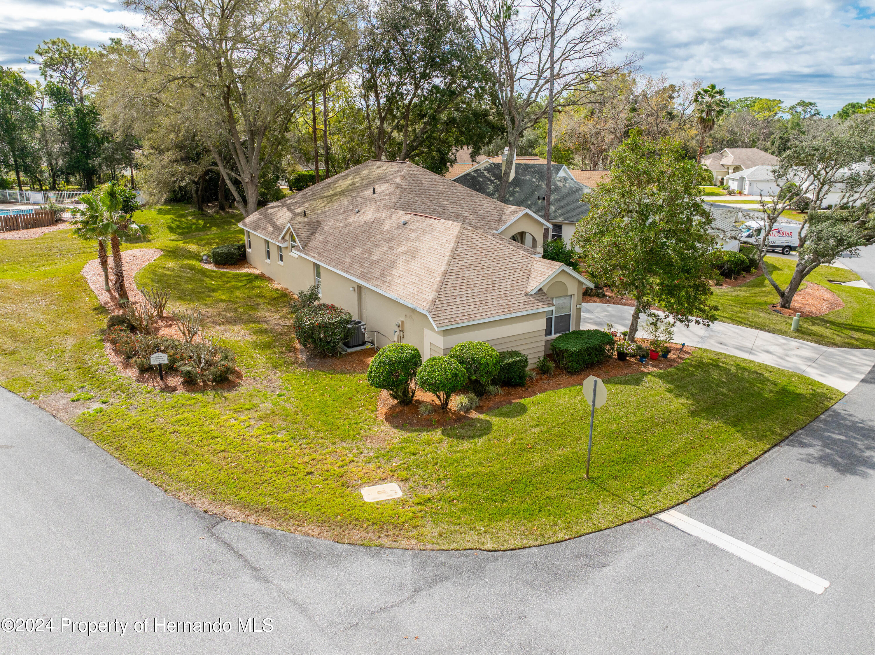 1 Byrsonima Loop Homosassa, FL 34446 - Photo 26 of 41 a view of a swimming pool with a yard