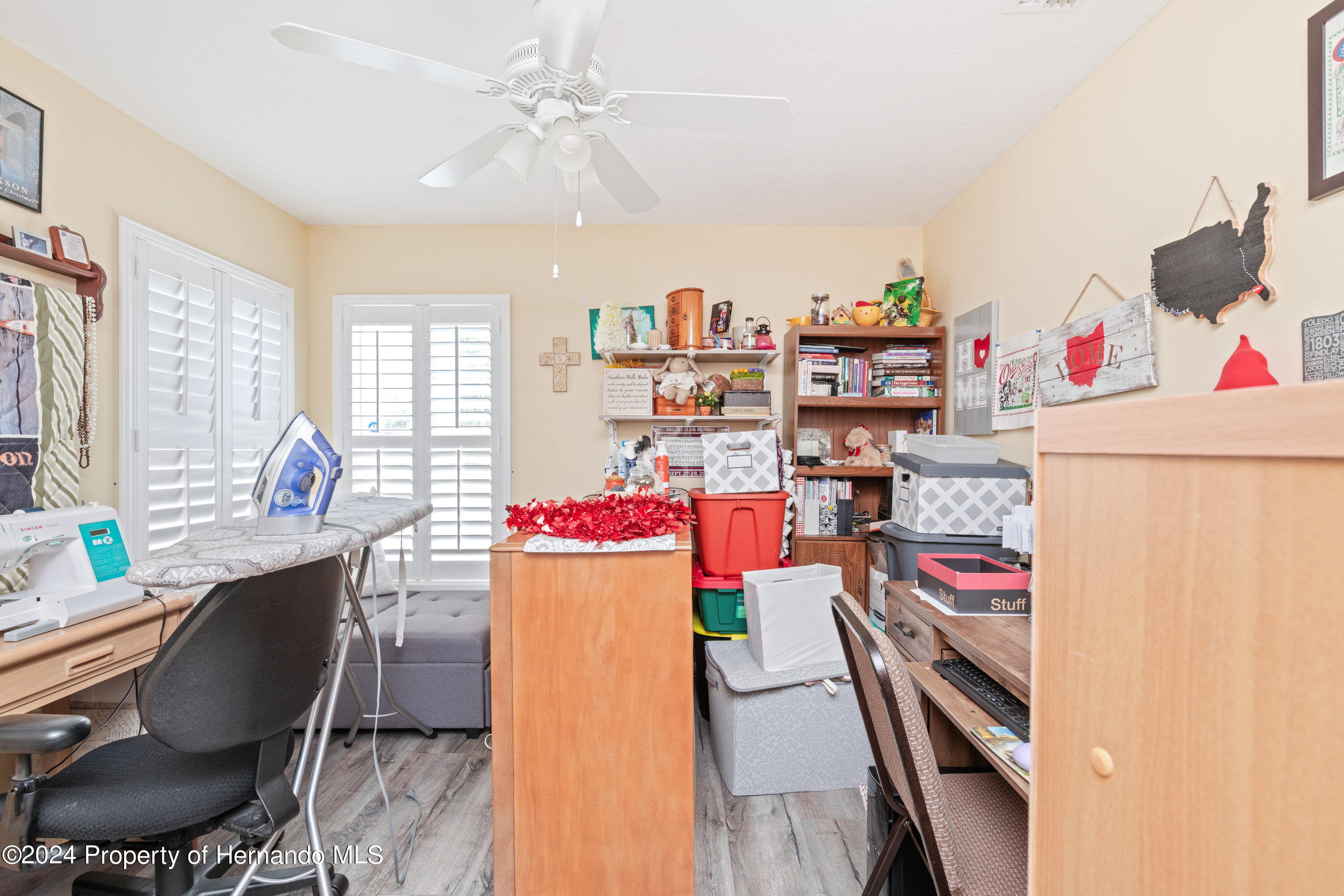 1 Byrsonima Loop Homosassa, FL 34446 - Photo 35 of 41 a living room with furniture and a window