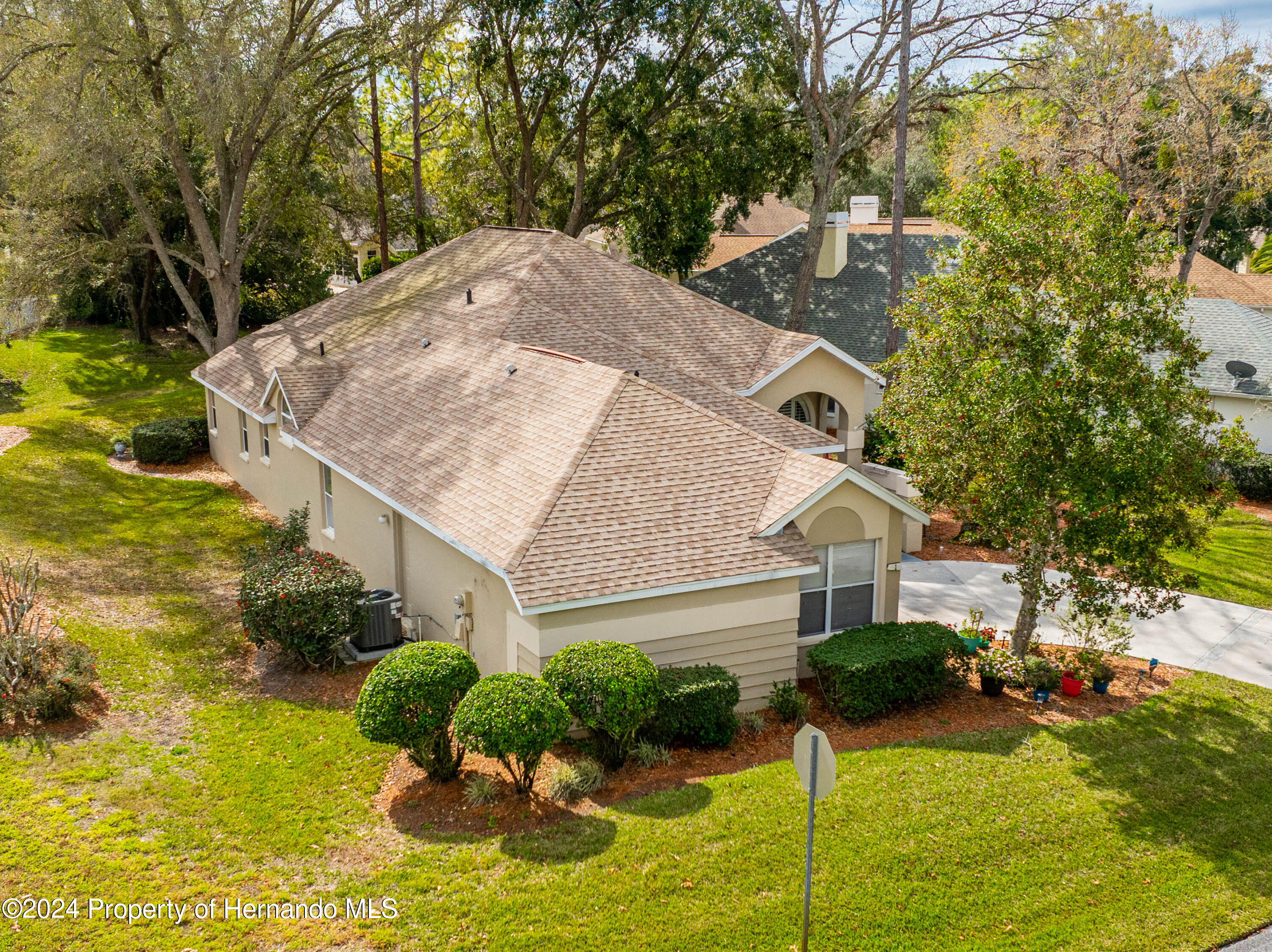 1 Byrsonima Loop Homosassa, FL 34446 - Photo 36 of 41 a view of a house with backyard and garden