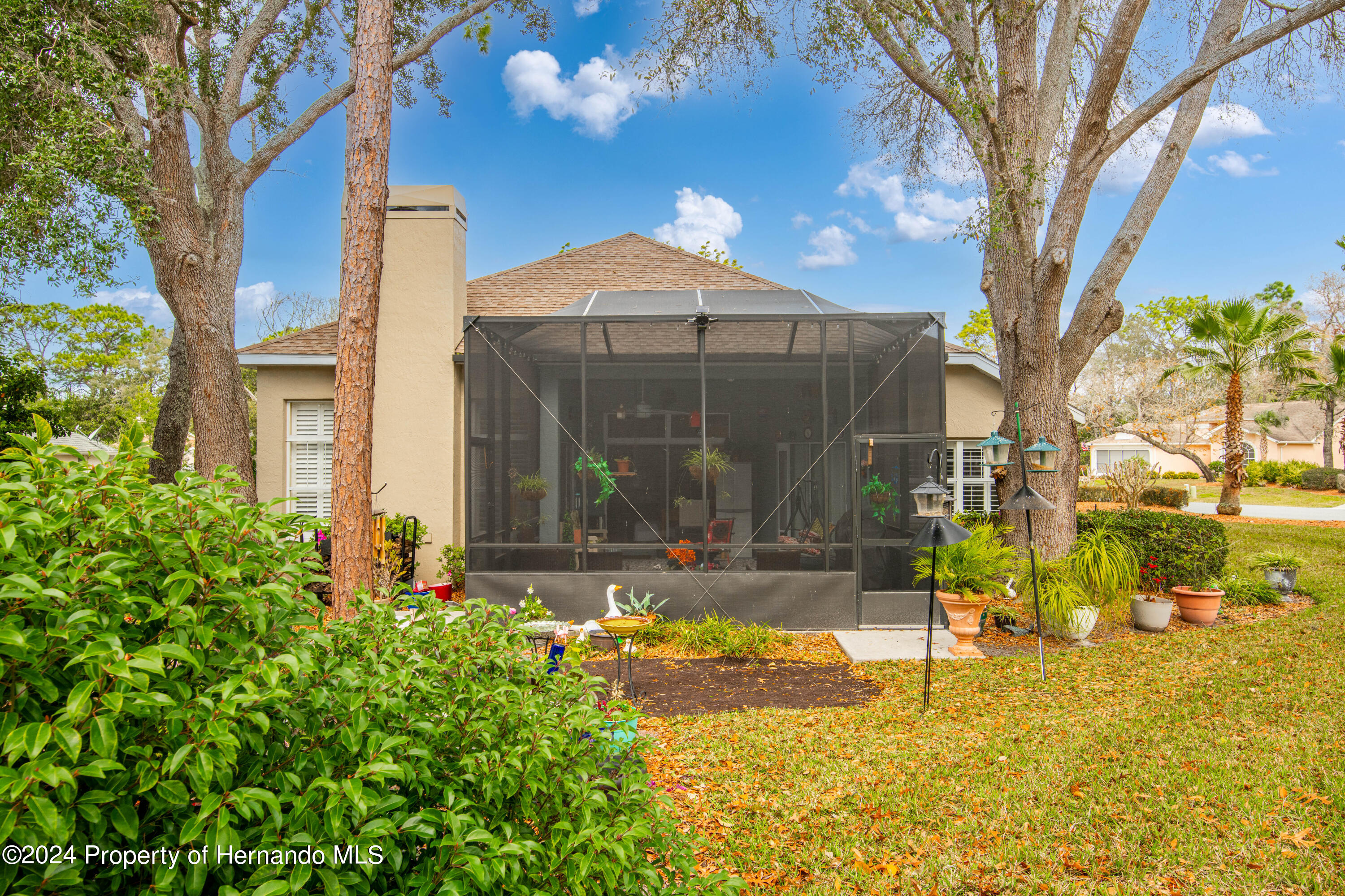 1 Byrsonima Loop Homosassa, FL 34446 - Photo 39 of 41 a view of a house with a yard