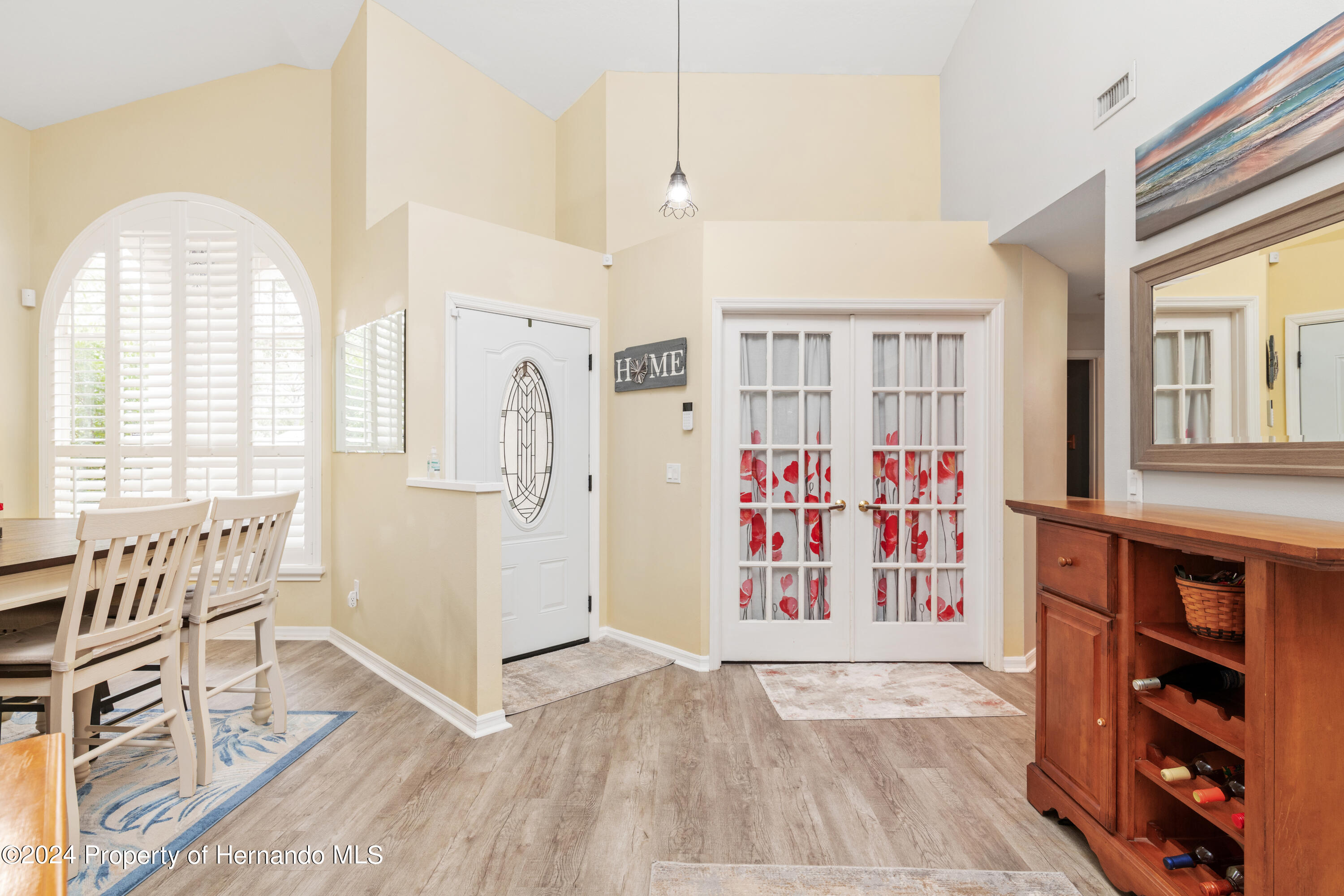 1 Byrsonima Loop Homosassa, FL 34446 - Photo 4 of 41 a view of a livingroom with furniture window and wooden floor