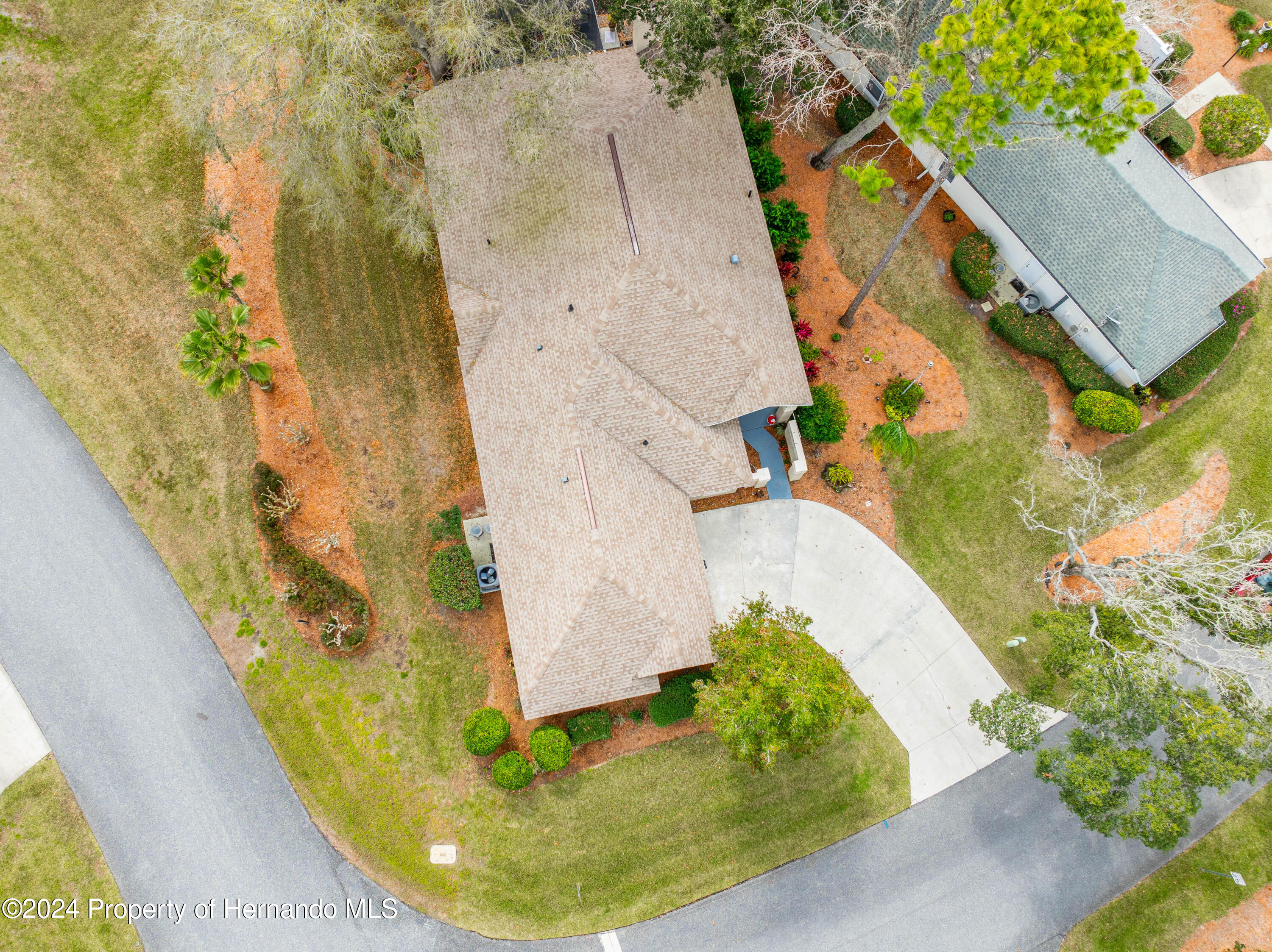 1 Byrsonima Loop Homosassa, FL 34446 - Photo 41 of 41 an aerial view of a house with a swimming pool