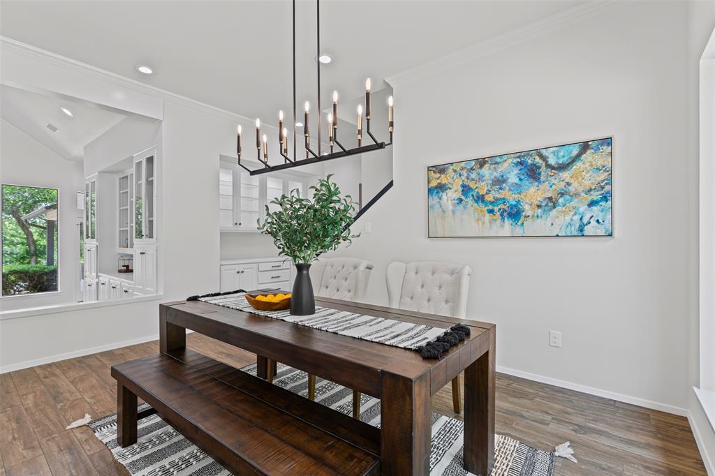 2109 Greta Lane Fort Worth, TX 76120 - Photo 11 of 40 a living room with furniture and a chandelier