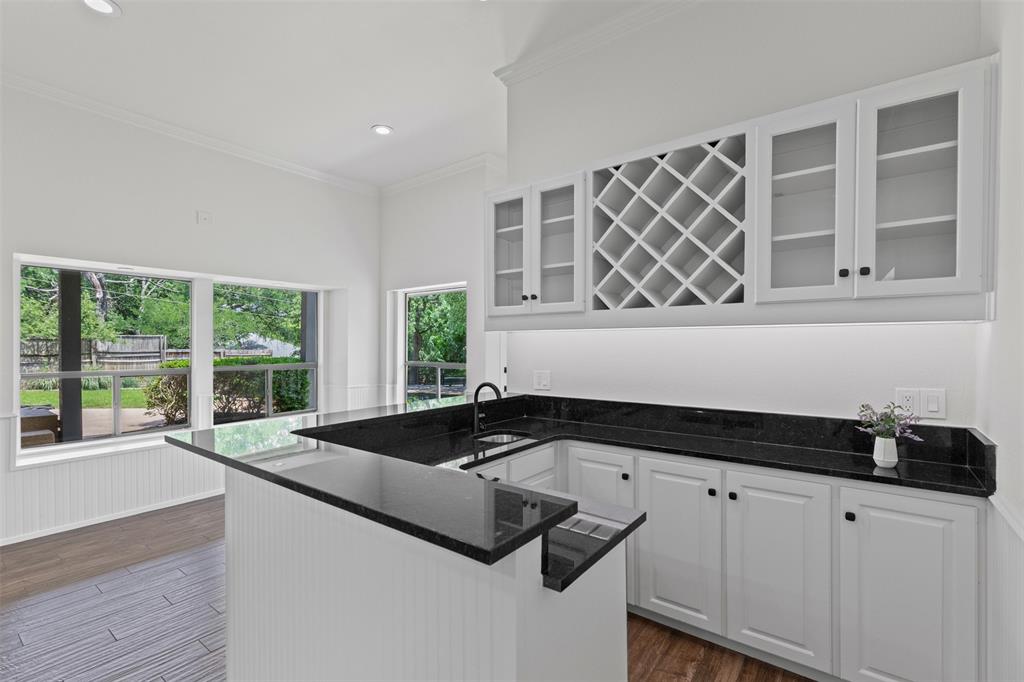 2109 Greta Lane Fort Worth, TX 76120 - Photo 18 of 40 a kitchen with a sink and cabinets