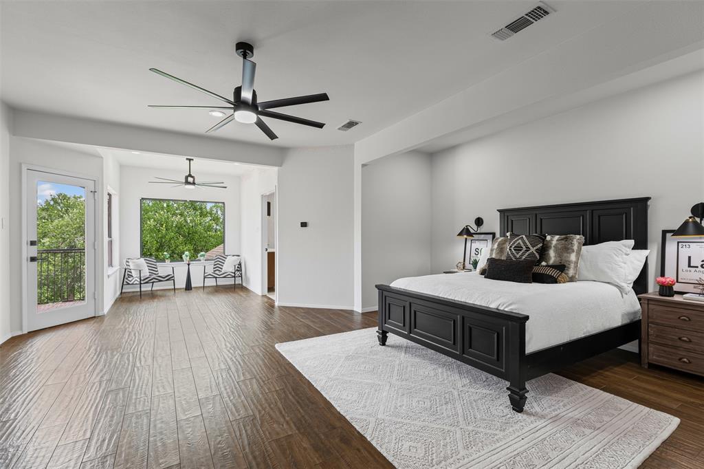2109 Greta Lane Fort Worth, TX 76120 - Photo 20 of 40 a living room with a bed furniture and a window