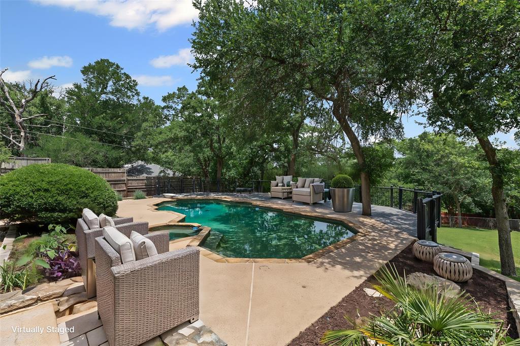 2109 Greta Lane Fort Worth, TX 76120 - Photo 39 of 40 a view of a garden with patio