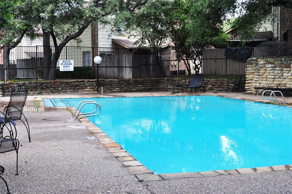 11311 Audelia Road, Unit 161 Dallas, TX 75243 - Photo 14 of 15 Community pool featuring a patio area