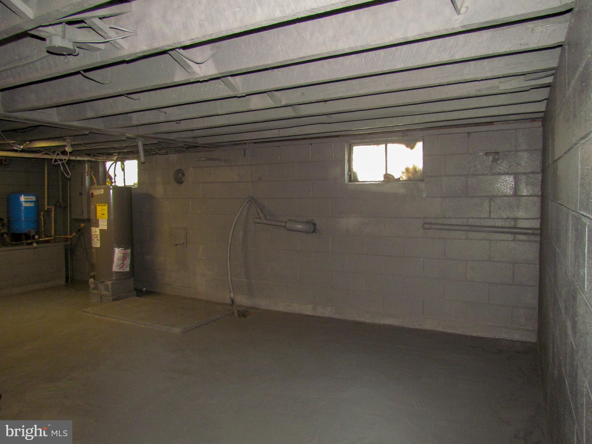 8907 Baltimore Road Frederick, MD 21704 - Photo 22 of 27 Flue for wood stove in basement