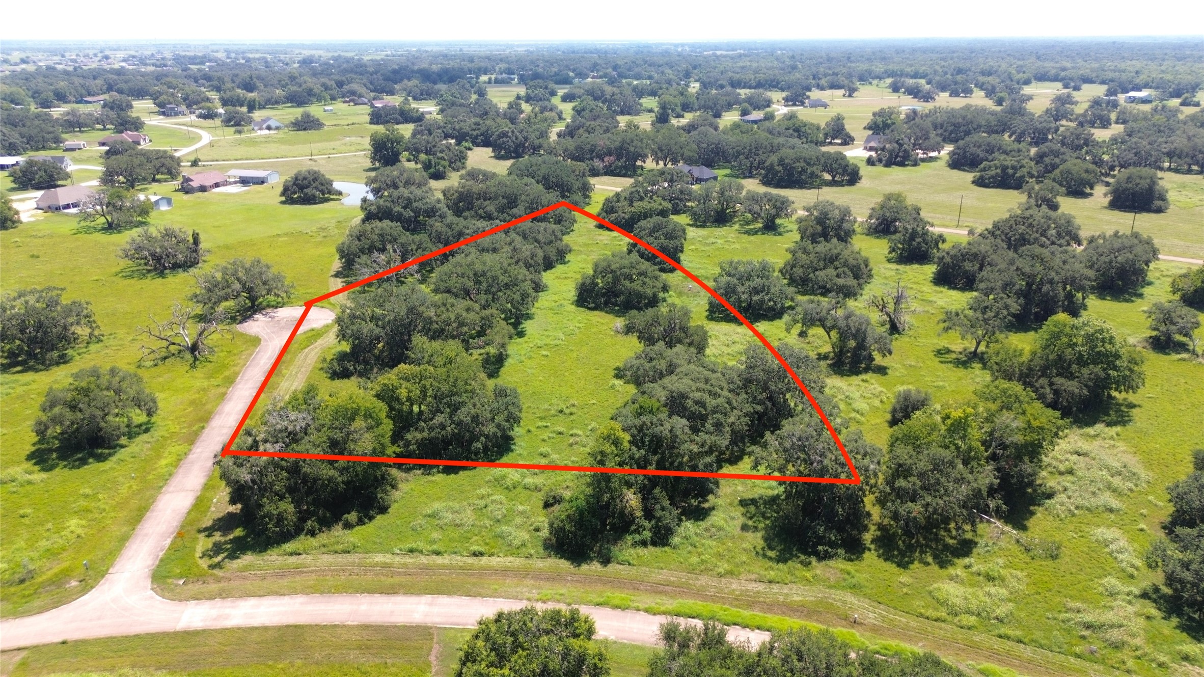 0 Old Henry Court Angleton, TX 77515 - Photo 2 of 10 an aerial view of lake