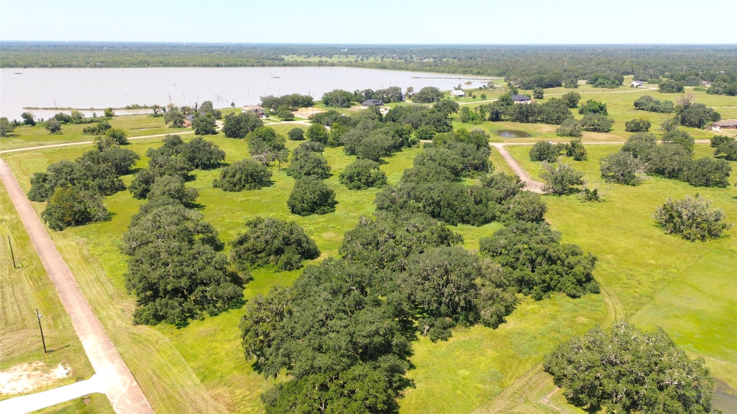 0 Old Henry Court Angleton, TX 77515 - Photo 5 of 10 a view of a lake