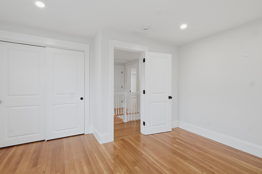 105 Stafford Road Lowell, MA 01852 - Photo 19 of 42 wooden floor in an empty room