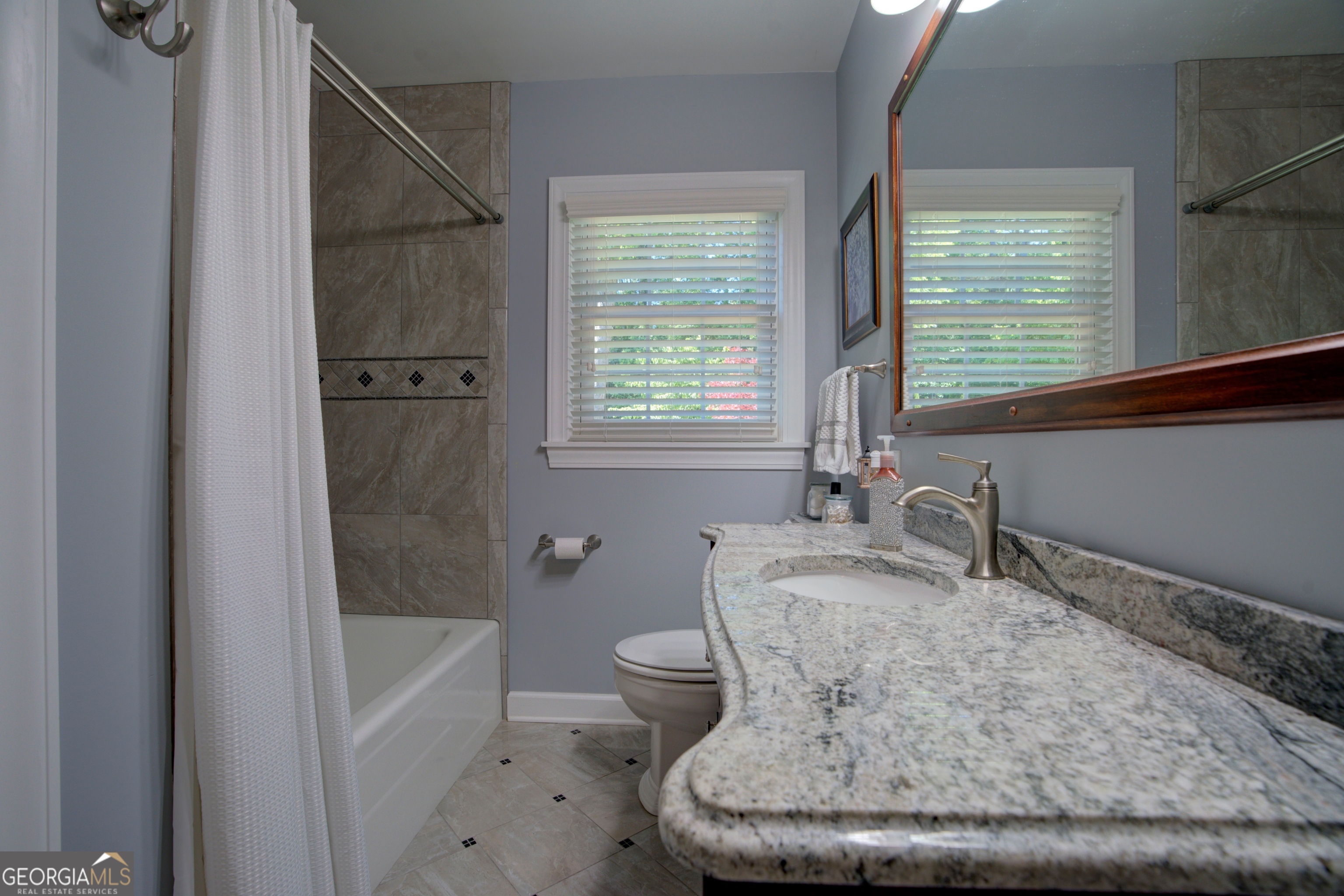 204 Green View Road Southwest Rome, GA 30165 - Photo 35 of 62 a bathroom with a granite countertop sink toilet and shower