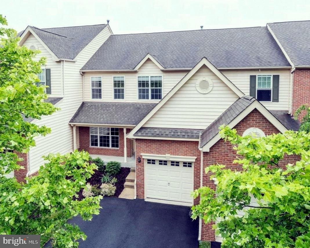 43605 Ryder Cup Square Ashburn, VA 20147 - Photo 1 of 48 front view of a house with a yard