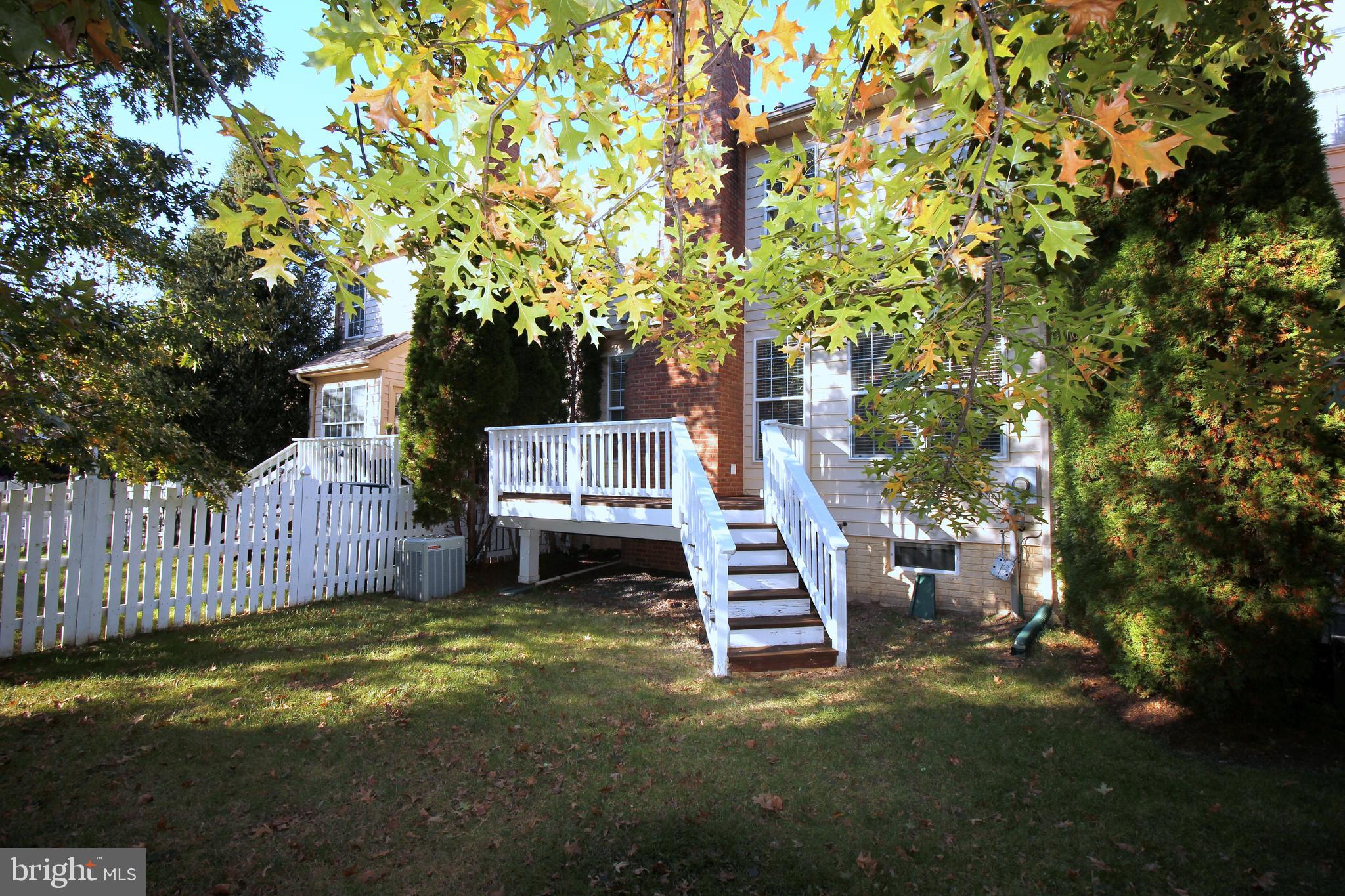 43605 Ryder Cup Square Ashburn, VA 20147 - Photo 3 of 48 a view of a house with a yard