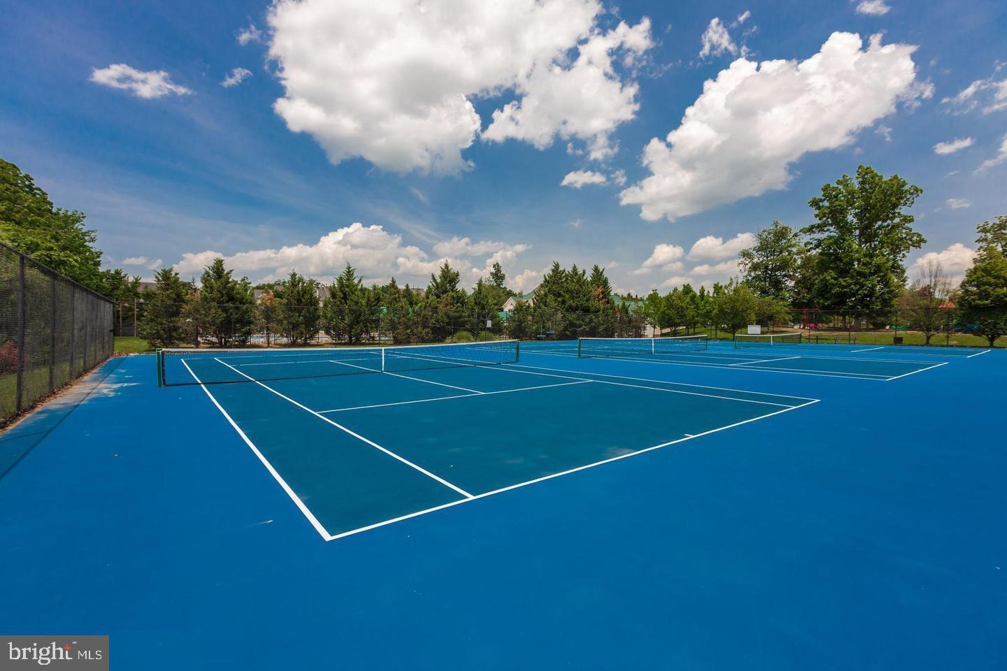 43605 Ryder Cup Square Ashburn, VA 20147 - Photo 38 of 48 a view of an outdoor space and tennis court