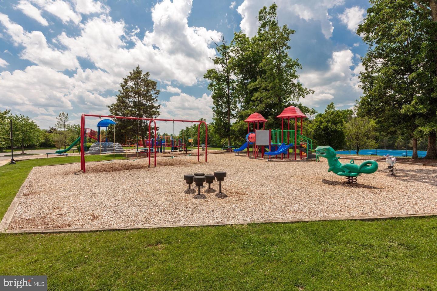 43605 Ryder Cup Square Ashburn, VA 20147 - Photo 42 of 48 a park with lots of swings and slides