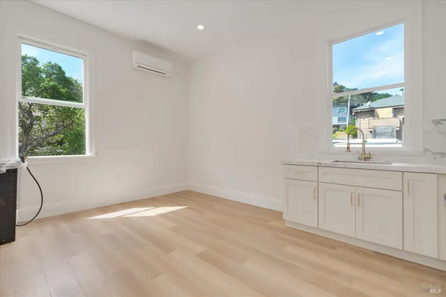 a view of a bathroom from a hallway