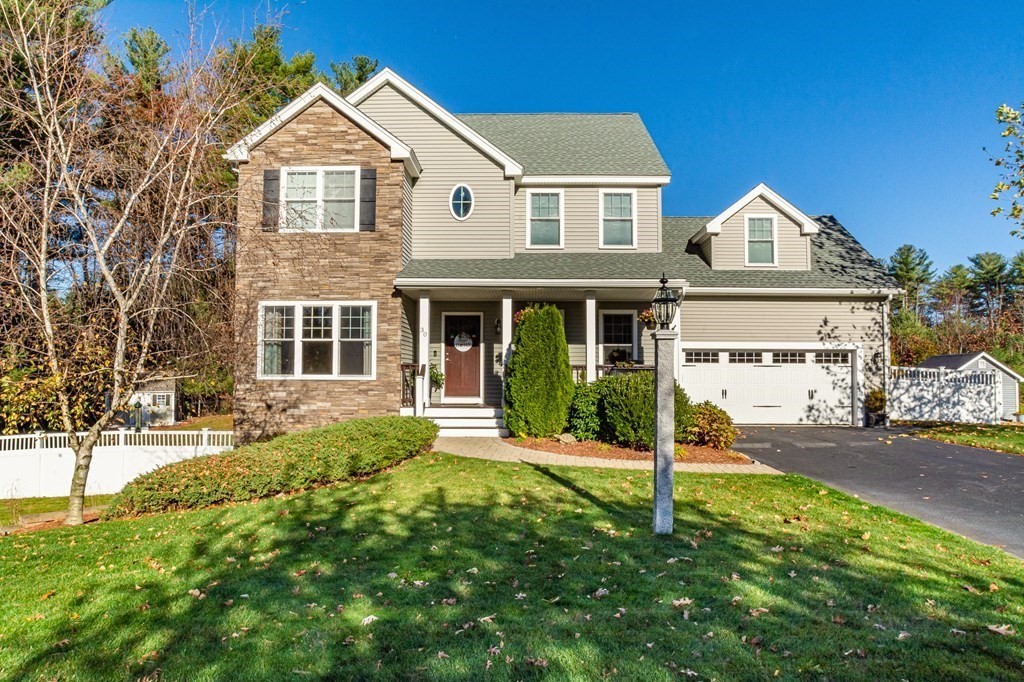 30 April's Way Tewksbury, MA 01876 - Photo 1 of 42 a front view of a house with a yard