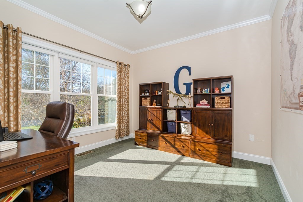 30 April's Way Tewksbury, MA 01876 - Photo 13 of 42 a view of a workspace with furniture and a window