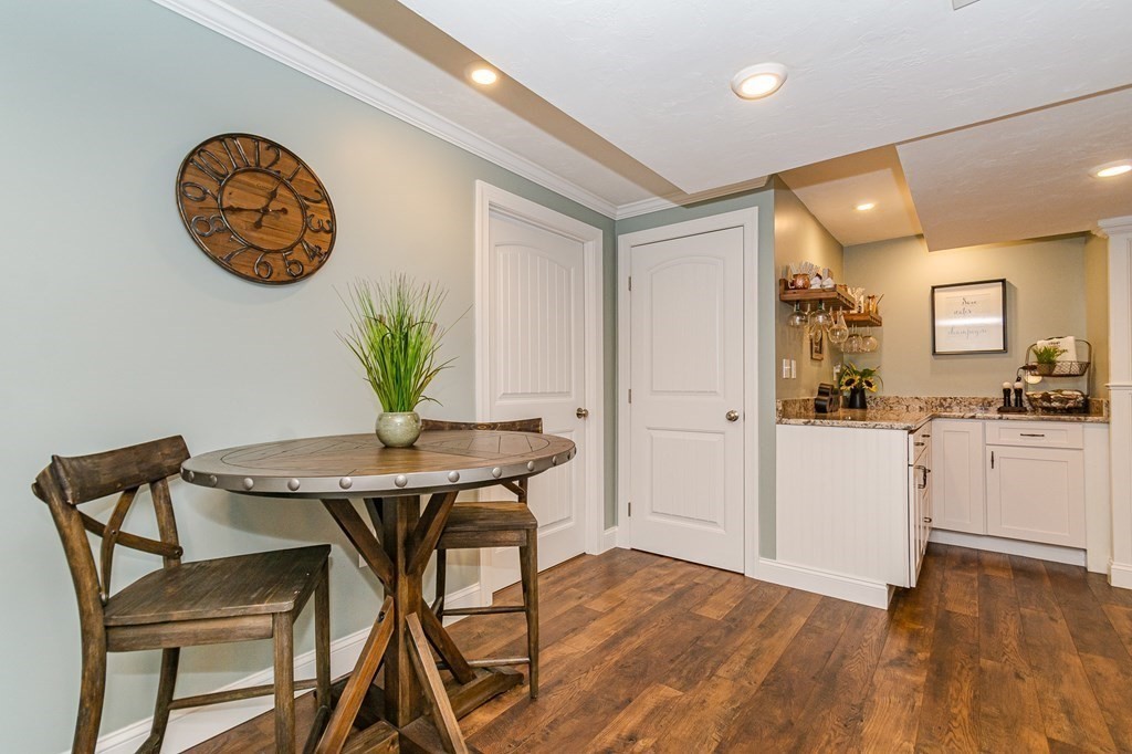 30 April's Way Tewksbury, MA 01876 - Photo 33 of 42 a view of a dining room with furniture and wooden floor