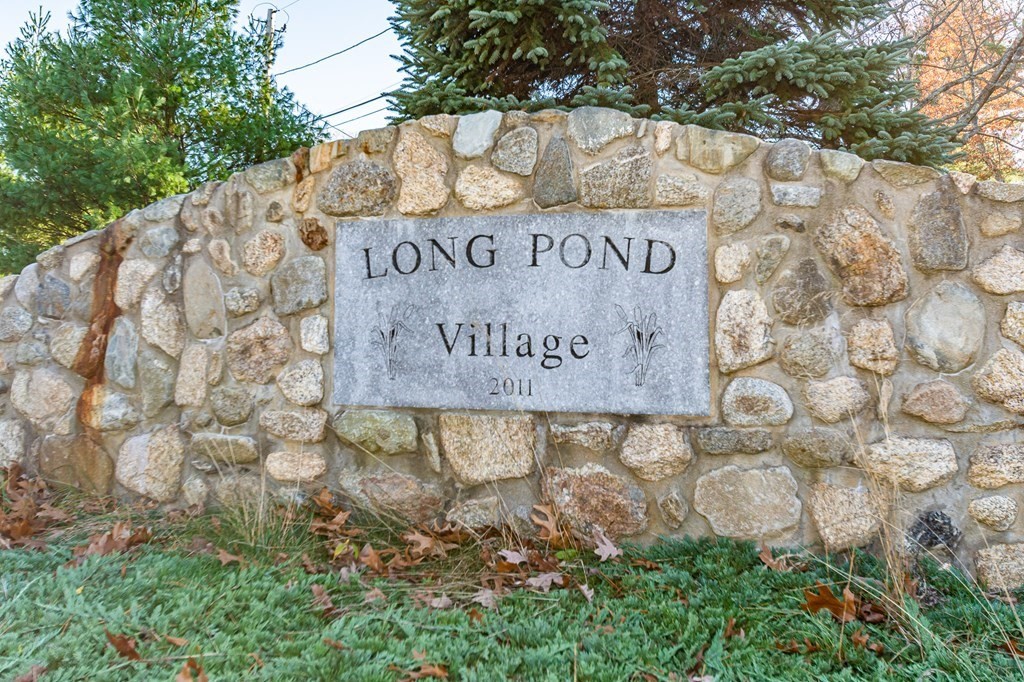 30 April's Way Tewksbury, MA 01876 - Photo 38 of 42 a sign that is on the side of a building