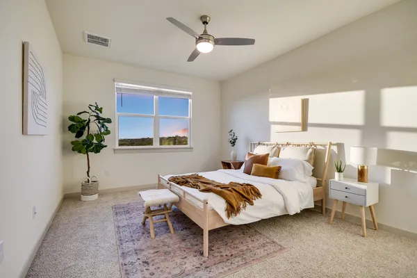a spacious bathroom with a double vanity sink a mirror and a shower