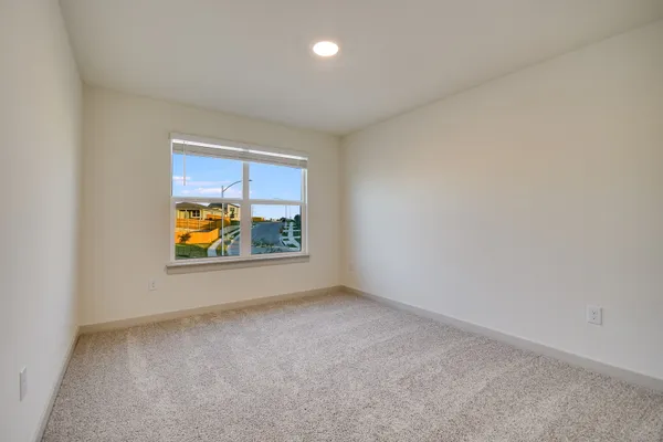 a view of porch with a door and a chair