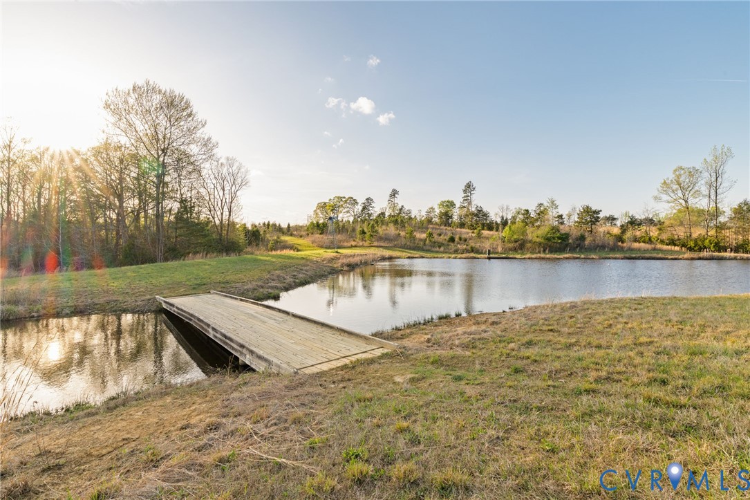 1895 Cemetery Road Chase City, VA 23924 - Photo 48 of 83 a view of a lake with a big yard