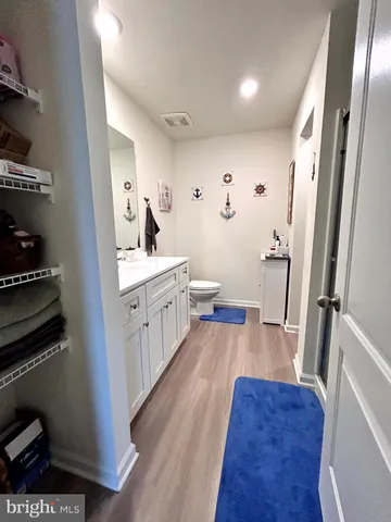a view of a kitchen from the hallway