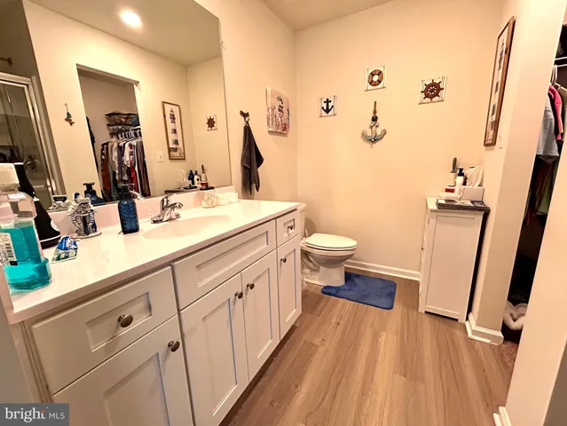 a bathroom with a double vanity sink and mirror
