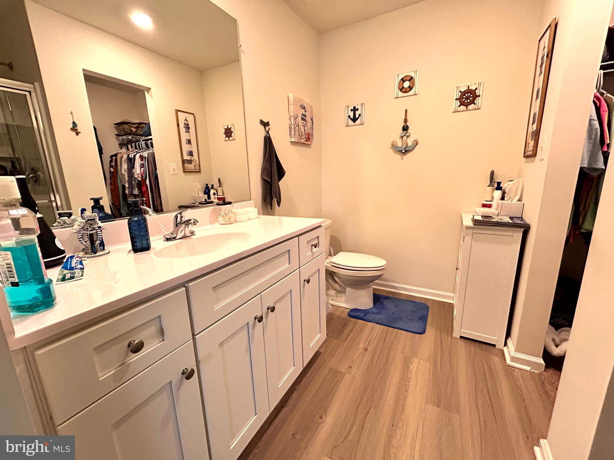 90 Rappahannock Run Falling Waters, WV 25419 - Photo 13 of 47 a bathroom with a double vanity sink and mirror