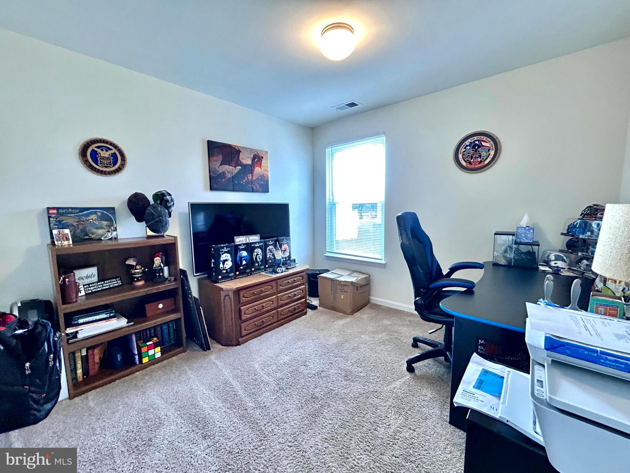 90 Rappahannock Run Falling Waters, WV 25419 - Photo 16 of 47 a living room with furniture and a flat screen tv