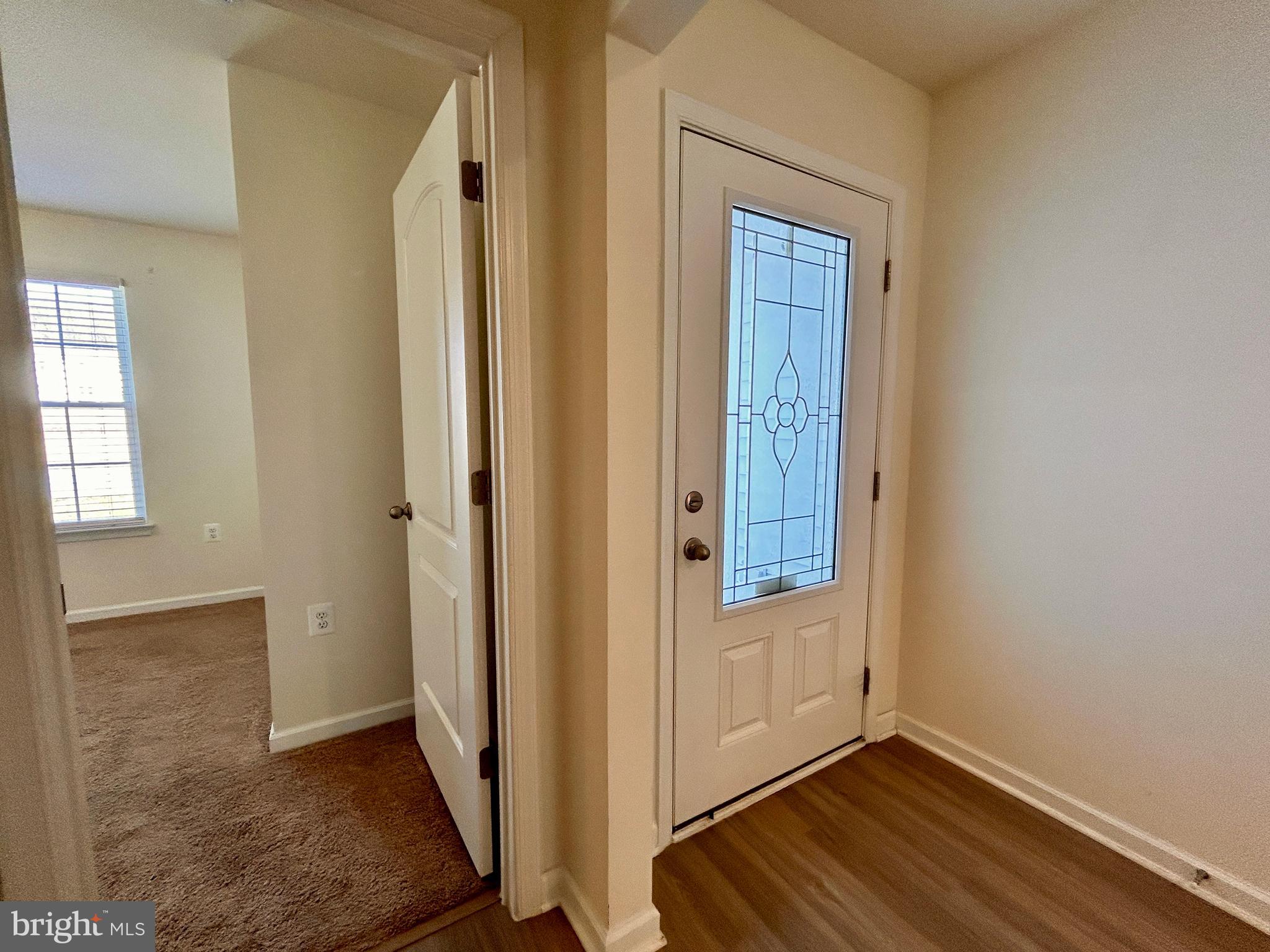 90 Rappahannock Run Falling Waters, WV 25419 - Photo 17 of 48 an empty room with wooden floor closet and windows