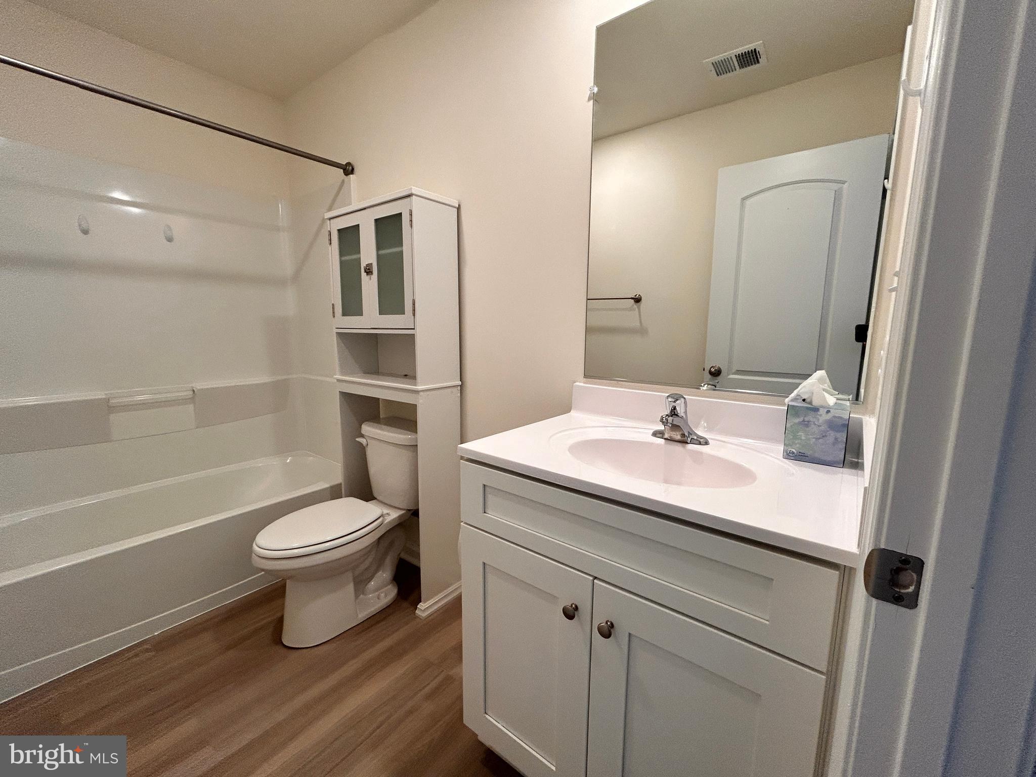 90 Rappahannock Run Falling Waters, WV 25419 - Photo 20 of 48 a bathroom with a sink toilet a mirror and shower