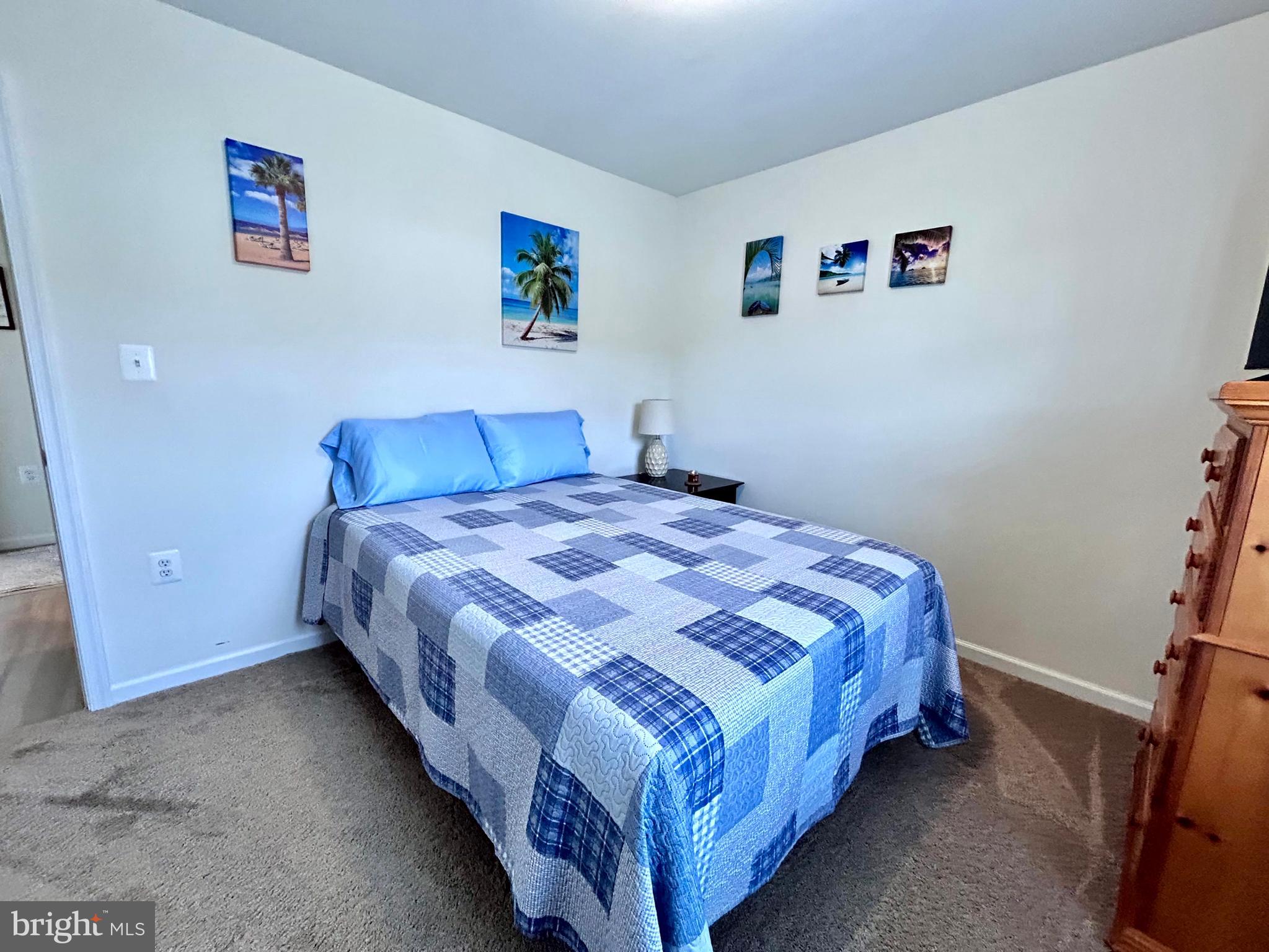 90 Rappahannock Run Falling Waters, WV 25419 - Photo 20 of 47 a bedroom with a bed and wall painting