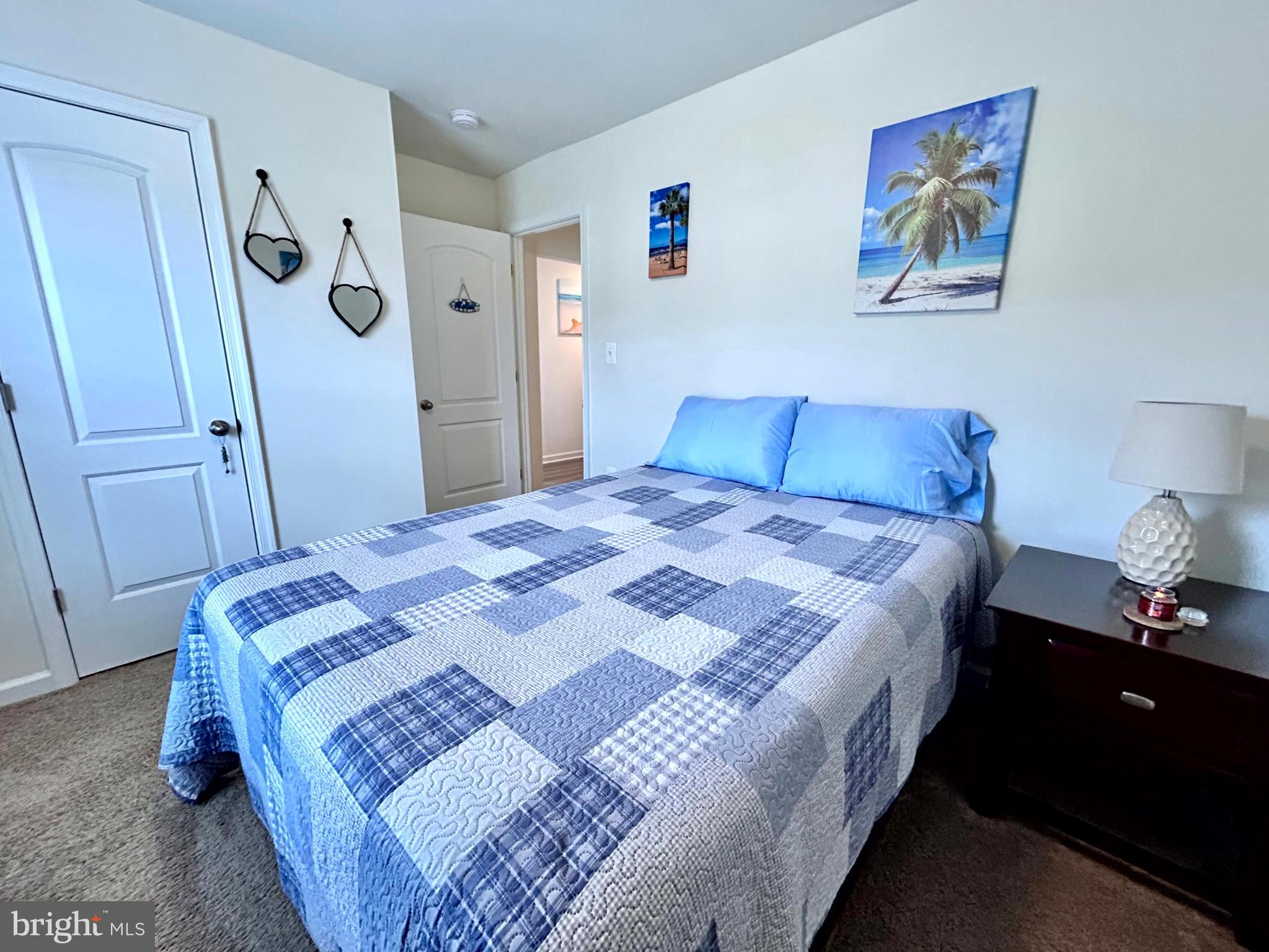 90 Rappahannock Run Falling Waters, WV 25419 - Photo 21 of 47 a bedroom with a bed and painting on the wall
