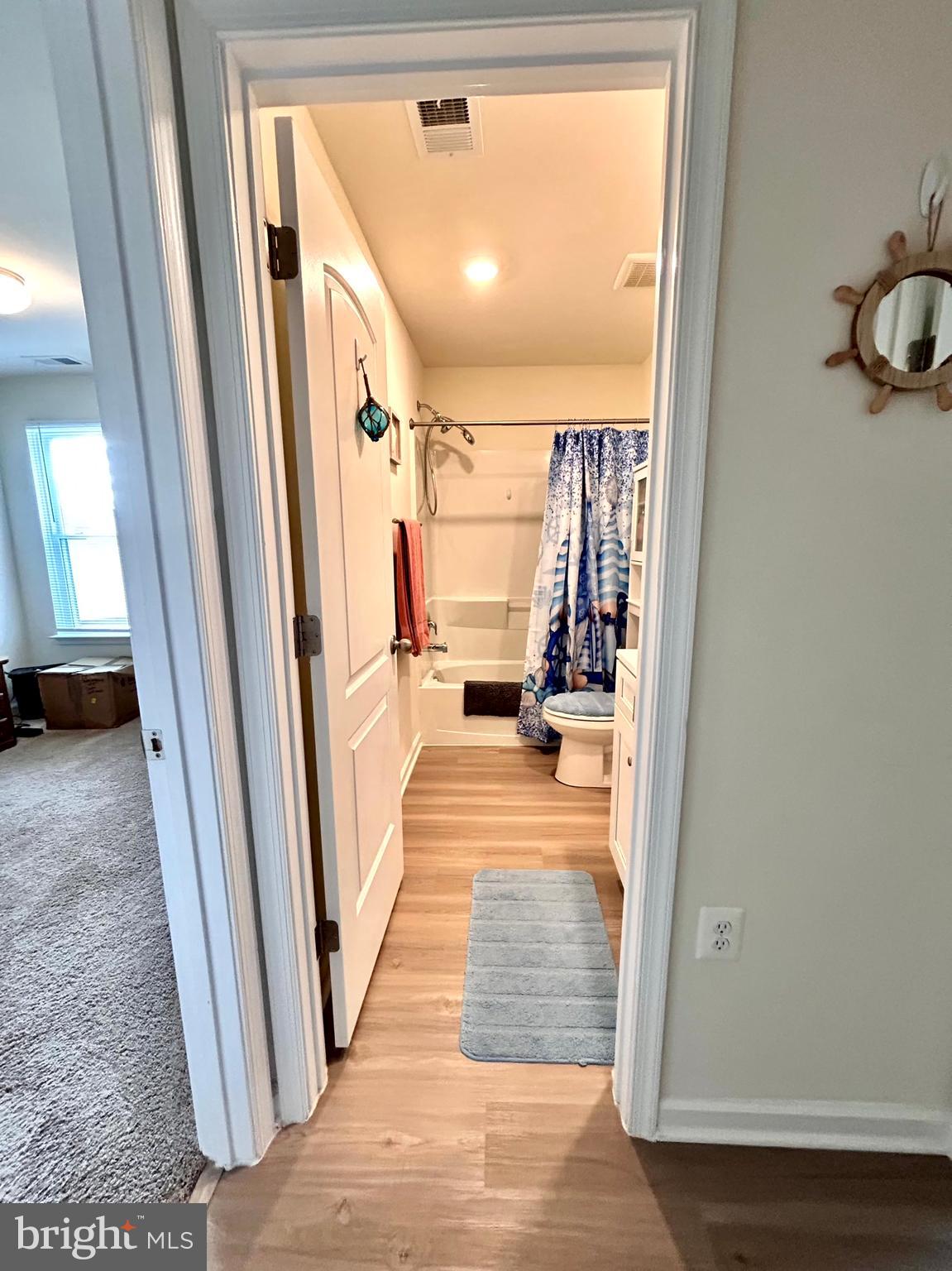 90 Rappahannock Run Falling Waters, WV 25419 - Photo 22 of 47 a view of a hallway with wooden floor and staircase
