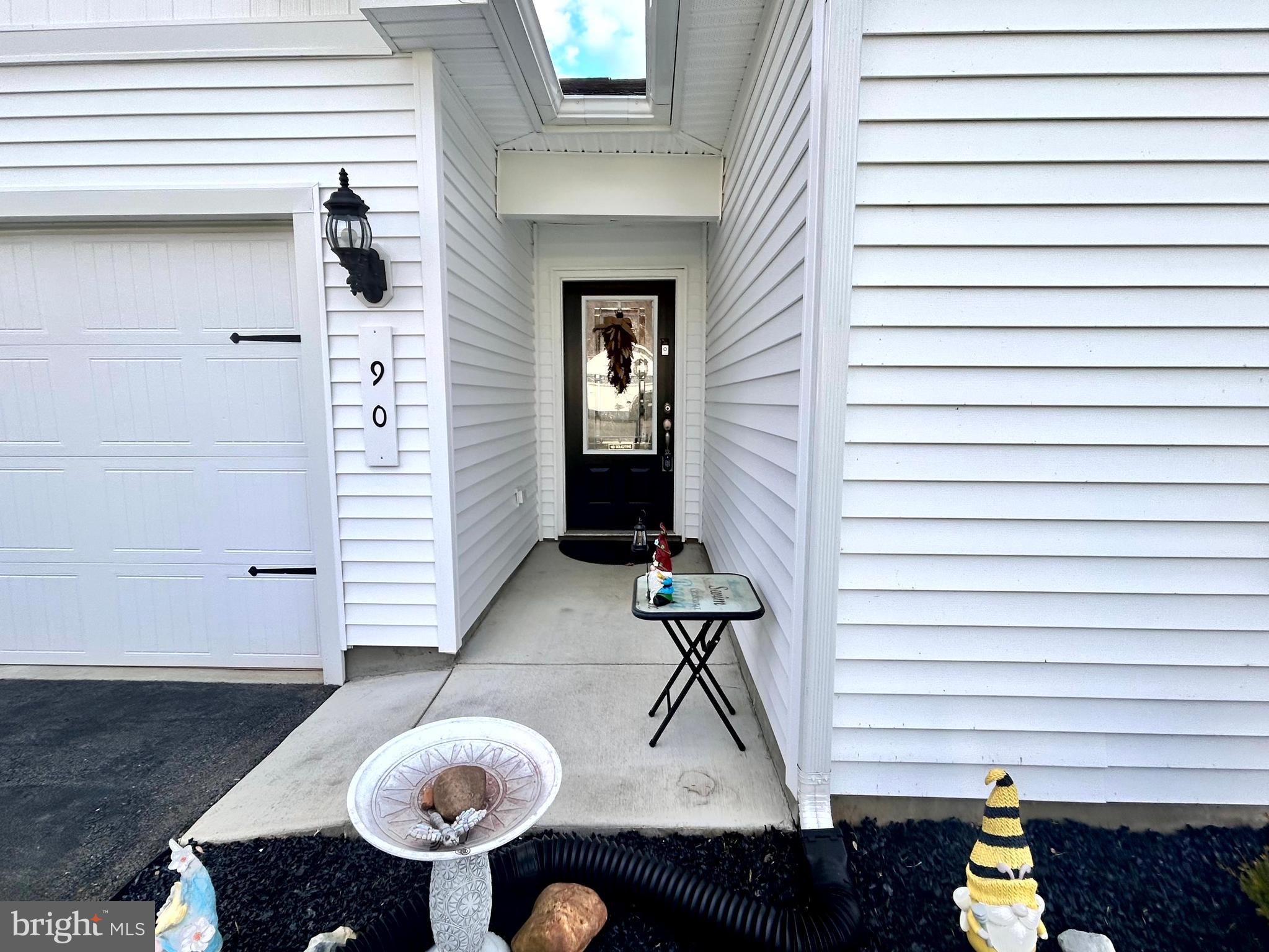 90 Rappahannock Run Falling Waters, WV 25419 - Photo 26 of 47 a view of entryway and patio