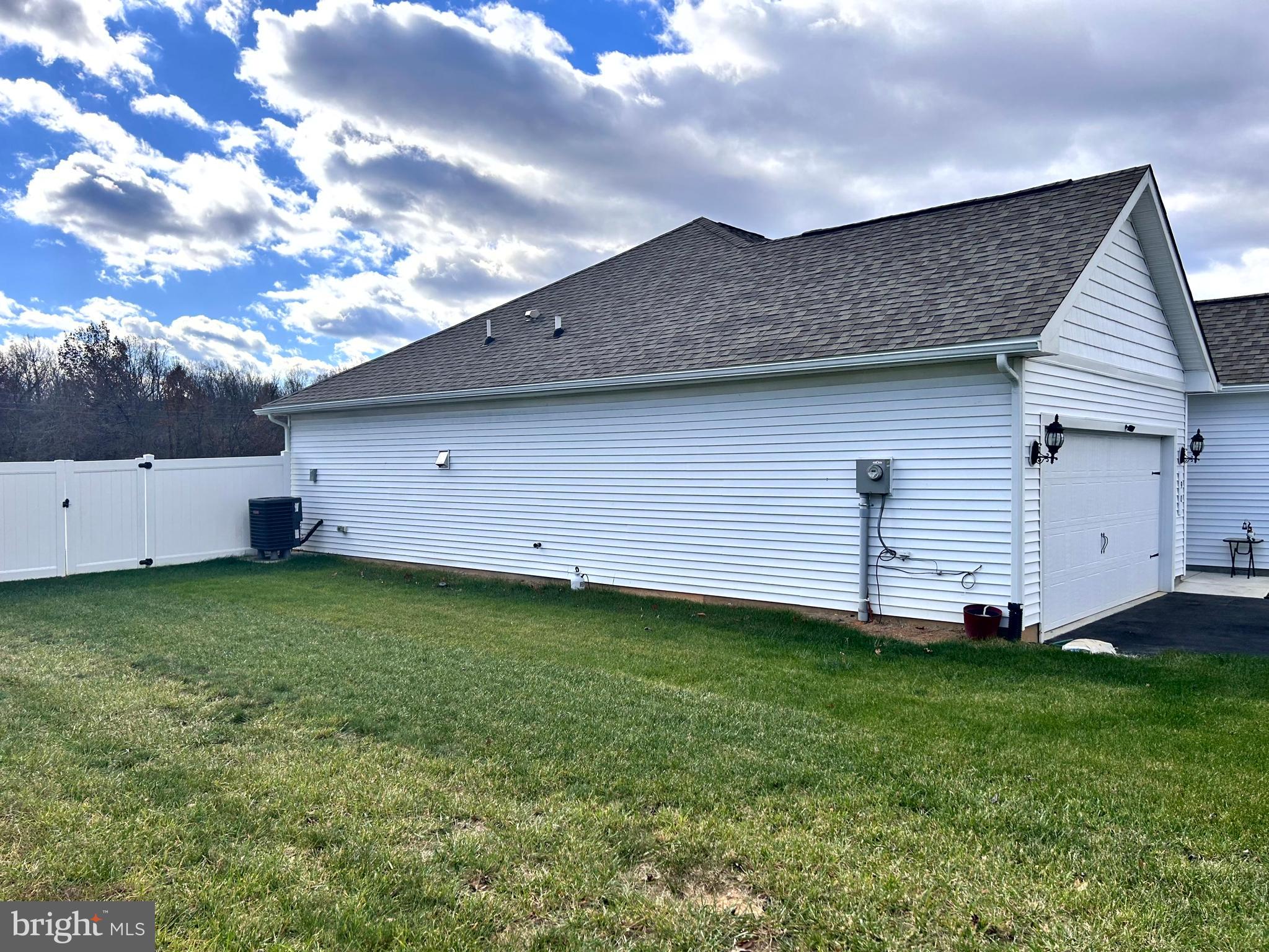 90 Rappahannock Run Falling Waters, WV 25419 - Photo 29 of 47 a backyard of a house with lots of green space